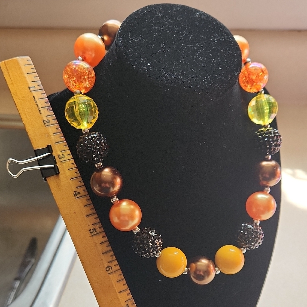 Orange and Yellow Beaded Necklace with Intricate Spacers